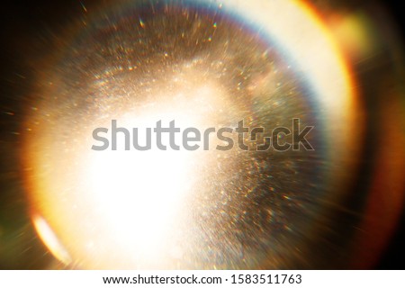 Easy to add overlay or screen filter over photos. Abstract sun burst. Digital lens flare background. Gleams rounded and hexagonal shapes, rainbow halo, iridescent glare.