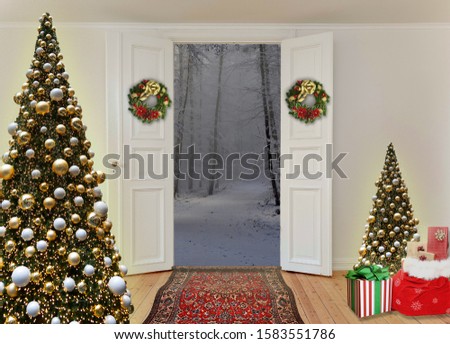 interior of a house decorated for Christmas in shades of white, red and gold