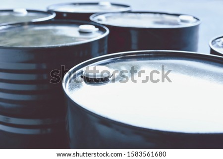 Black Oil Barrels or Steel Industrial Chemical Drums for Petrochemical Industry Royalty-Free Stock Photo #1583561680