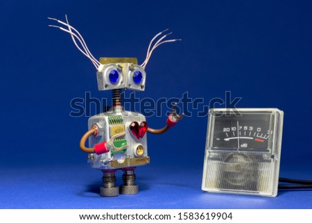 Funny robot electrician on a blue background with VU meter.