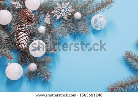 Christmas decorations on blue paper background