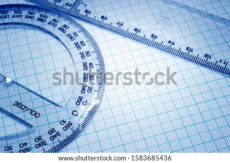 graph paper, protractor and drawing line