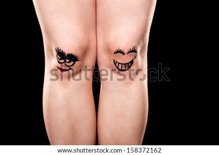 couple of knees with faces