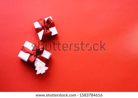CHRISTMAS GIFT AND DECORATIONS OVER RAD BACKGROUND