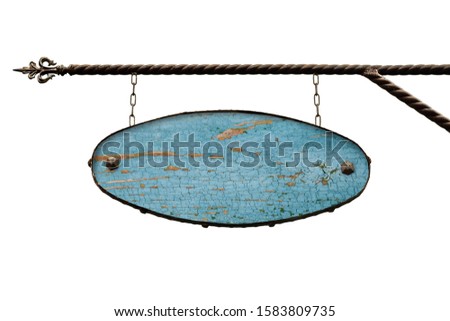 Oval blue wooden signboard. An old wooden store sign with no text hanging on a wrought iron structure. The template is isolated on white. Blank for creativity and design.