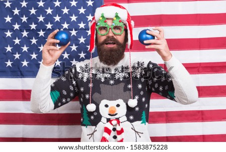 Spread joy. Bearded american man. Celebrate Christmas and new year american way. Winter greetings. Having fun. Cheerful hipster. Great american Christmas. Happy santa american flag background.