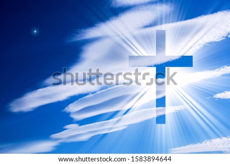Glowing cross . Easter background .    Christian cross against the sky 