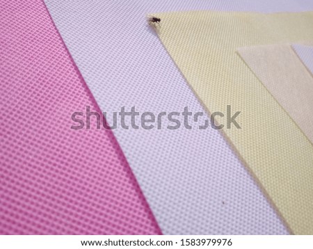 lying Colored Non Woven Polypropylene Fabric Background 