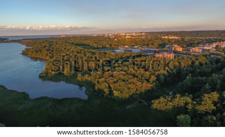 Aerial view of the west tip of Lake Ontario in Cootes Paradise located in Hamilton, Ontario.