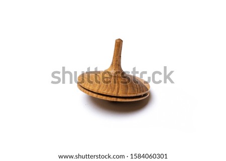 Wooden Driedel spinning top image traditional Hanukkah toy Jewish holiday on a white background 