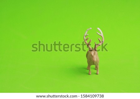 reindeer toy in color background