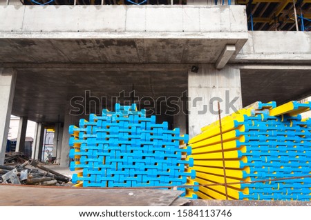 Prepared stock for concrete work in the construction of a building made of concrete. Formwork boards for construction