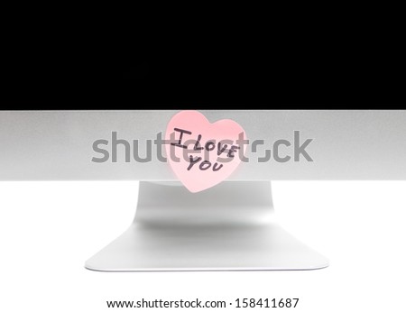 PC with a sticky note in the shape of a heart