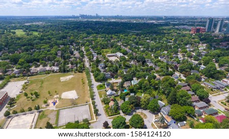 Aerial view of a residential neighbourhood near Sir Adam Beck Park in the Etobicoke area of Toronto, Ontario. 