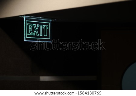 Acrylic sign for cinema exit
