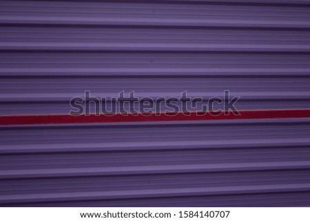 Purple metal lines with one red line wall for background or texture