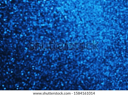 Blurred texture of glitter's paper. Festive background. Color of the year 2020 concept.