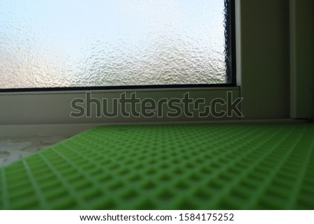 Frosted glass window in kitchen