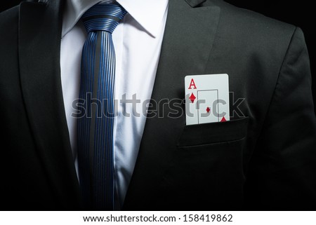 detail photo, ace card in his suit pocket