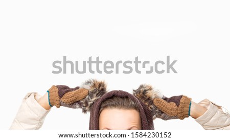 Winter woman wearing fur hat with ears, concept of 2020 new year, mouse symbol