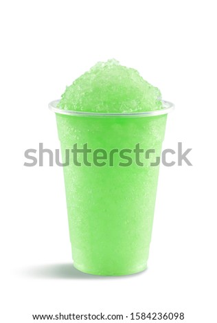 Food photography of lime slushy slushie frappe in a plastic cup on a white background Royalty-Free Stock Photo #1584236098