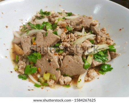 Homemade spicy liver salad (Thai food) Royalty-Free Stock Photo #1584267625
