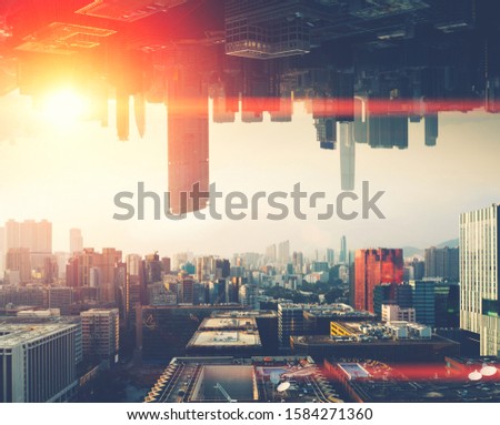 Futuristic multiverse world concept. Downtown with skyscrapers skyline under and cityscape over. Two parallel worlds. Alternative reality dimension Royalty-Free Stock Photo #1584271360