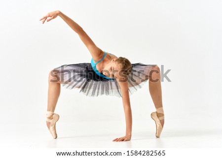 Woman ballerina dance exercises classic performance style