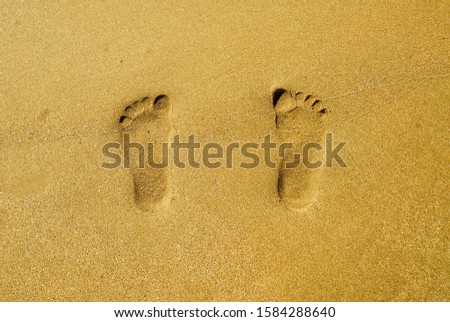foot print. its my friend foot print on beach. its amazing picture because of sun light timing. some time you see its Embossed and some time its look normal foot.
some my friends says how you take.