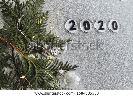 Happy new year 2020 wallpaper on grey glitter background 