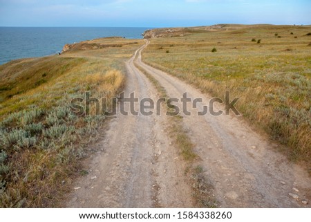 dirt road near the sea