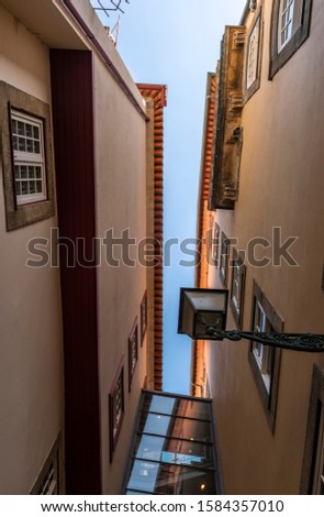 The sky is in the gap between the nearby houses. Porto Portugal.