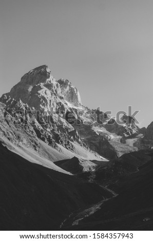 Black and white shot of Mount Ushba, Main Caucasian ridge. Zemo Svaneti, Georgia. Autumn landscape.
