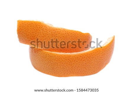 Red grapefruit peels isolated on white background