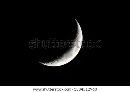 A crescent moon on a clear night