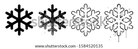 Vector set of grungy snowflakes. Black stamps on a white background. Silhouette, stencil template and weathered examples. Sponge painting, splatter and grainy textures. Icons of harsh urban winter