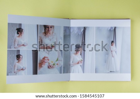 Luxury white leather wedding photo album and photo book.