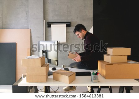 Young Man Working in Delivery service	
