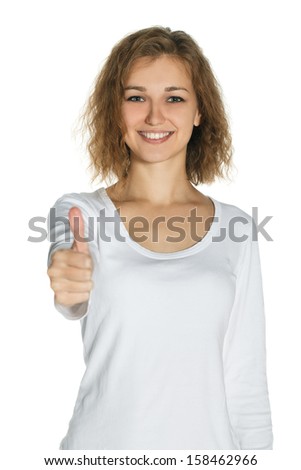 Young girl smiling, thumbs-up