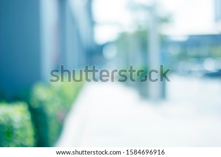 The pedestrian mall that has blurred abstract background bokeh effects for the business concept.