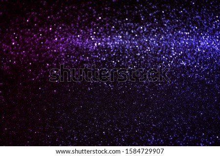 Soft image abstract bokeh dark blue,purple with light background.Blue,black color night light elegance,smooth backdrop,artwork design for new year,Christmas sparkling glittering or special day.
