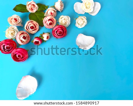   Pink white roses bouquet  on blue and coral   floral background copy space happy romantic  Valentine , women day  and birthday greetings card,Beautiful wishes quotes text on