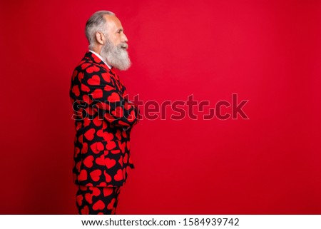 Profile side view portrait of his he nice attractive trendy content bearded gray-haired man wearing theme costume festal day folded arms isolated on bright vivid shine vibrant red color background