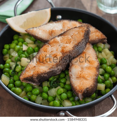 Pan Seared Halibut with Vegetables and Green Peas as Side Dish