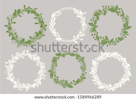 Christmas wreaths silhouettes vector illustrations set. Stylish white and green frames isolated on grey background. Empty ilex and fir twigs round borders with text space. Decorative Xmas elements. Royalty-Free Stock Photo #1584966289