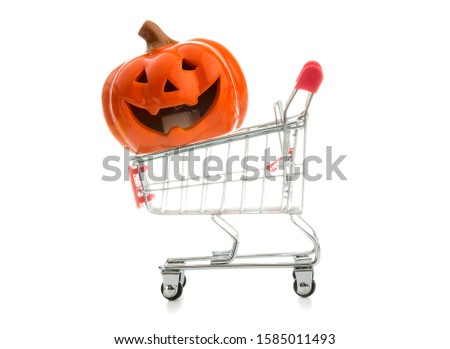 Happy Halloween  Pumpkin, Jack O Lantern in Shopping supermarket cart  against white background