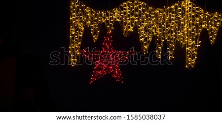 yellow christmas lights with black background