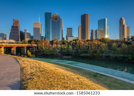 Houston skyline looking east from Buffalo Bayou hike and bike trail on Buffalo Bayou Houston Texas.