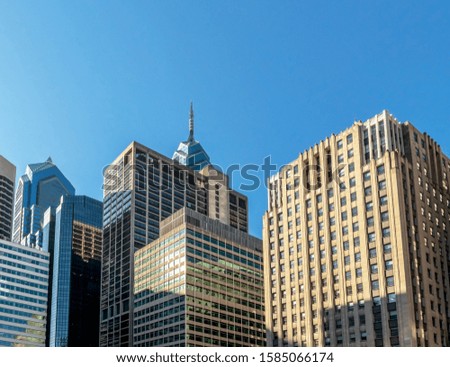Highrise buildings in Philadelphia, Pennsylvania, downtown. Skyscrapers on blue sky.