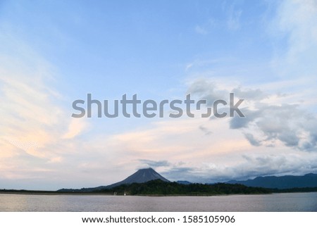 lake and mountains, photo as a background ,taken in Arenal Volcano lake park in Costa rica central america